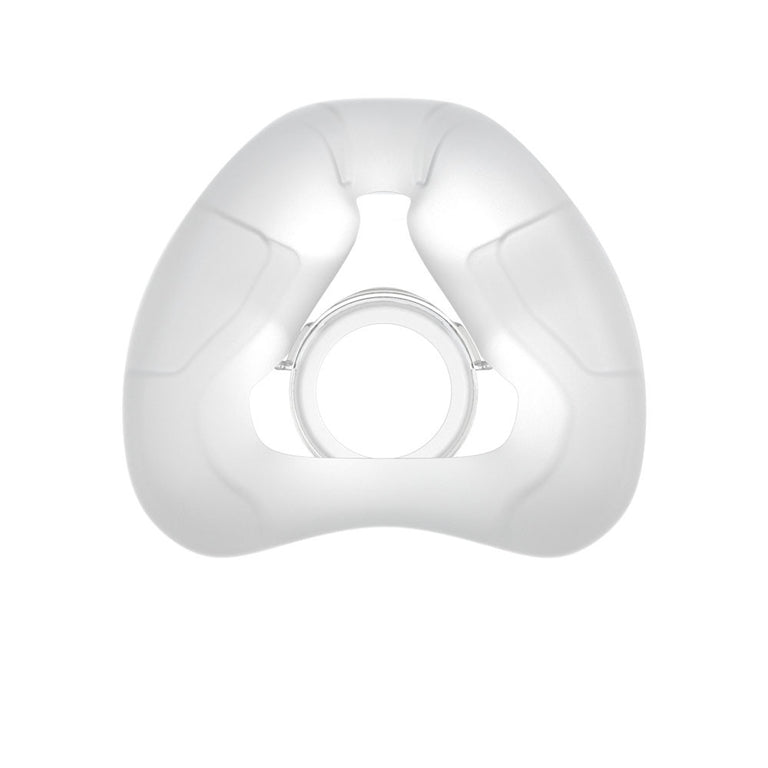 A white, silicone replacement cushion for the nasal mask, viewed from the front.