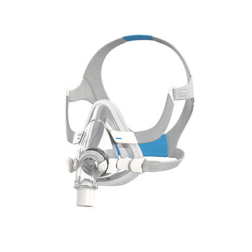 A full face CPAP mask with headgear and a transparent cushion