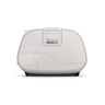 ResMed AirCurve 11 ASV device placed on top of a packed travel suitcase, representing portability for use while travelling.
