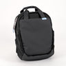  backpack in black facing front with a tag attached.