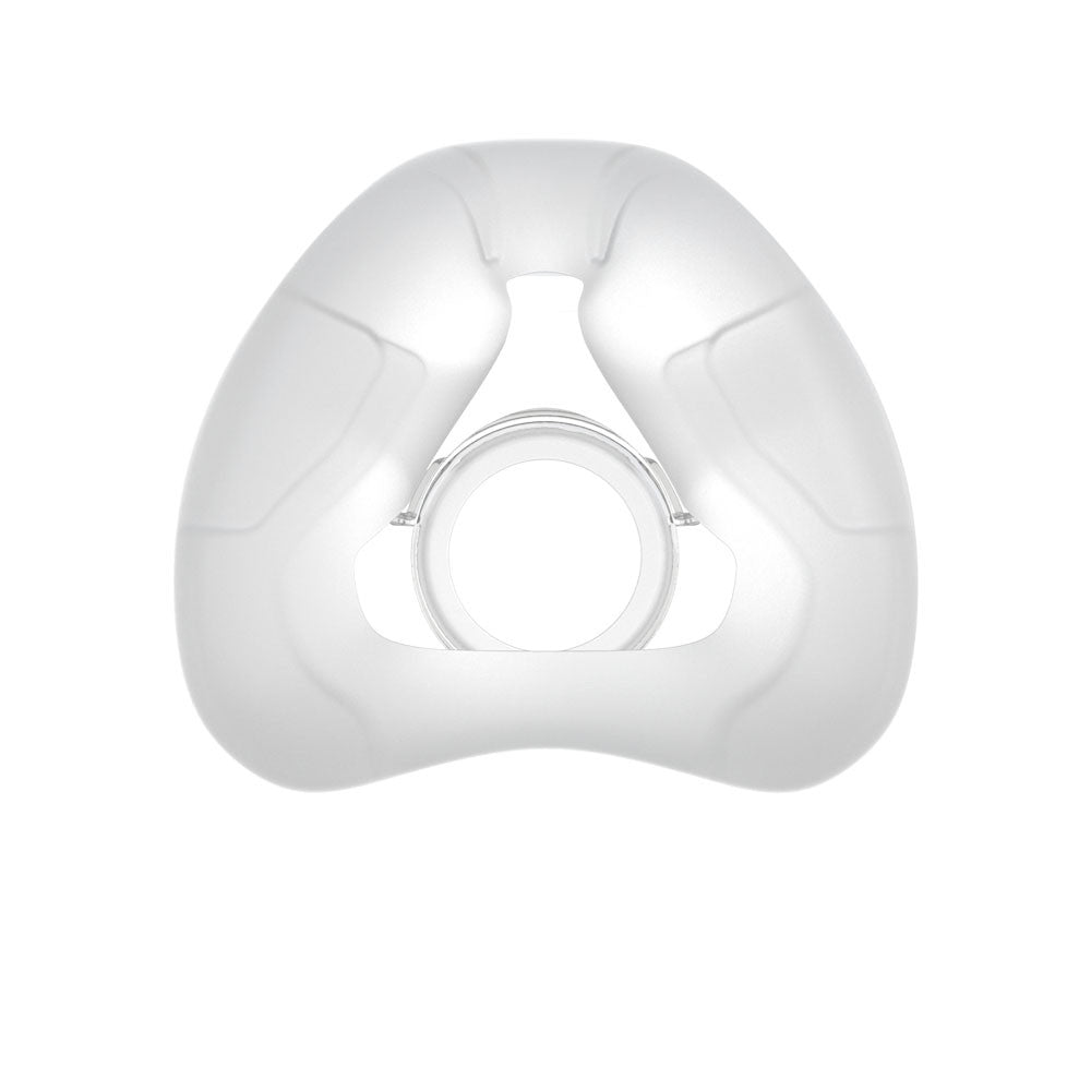 A white, silicone replacement cushion for the nasal mask, viewed from the front.