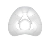 A white, silicone replacement cushion for the nasal mask, viewed from the front.