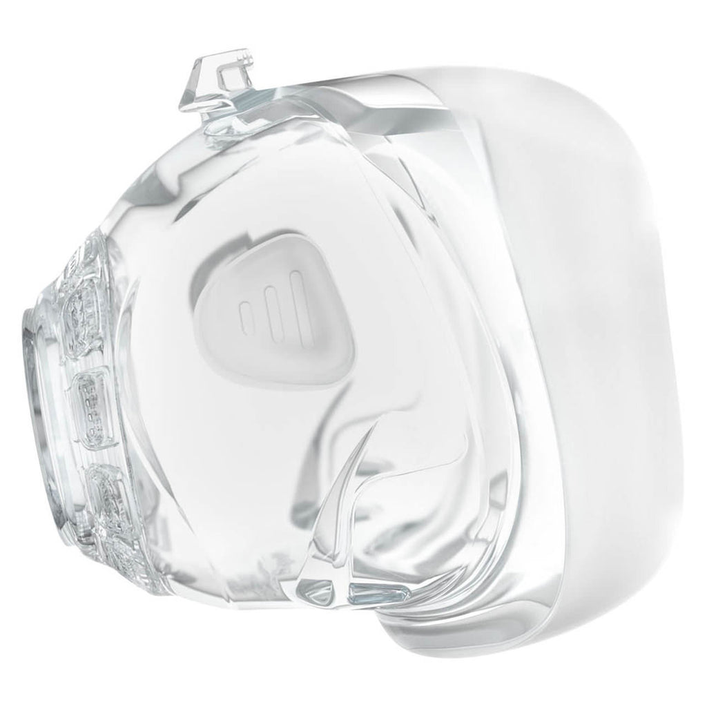 A transparent, silicone cushion part of a CPAP mask designed to fit over the nose and mouth, with a visible soft padding area.