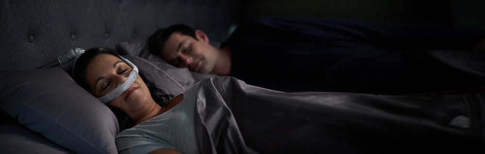Woman Sleeping With the ResMed AirFit P30i