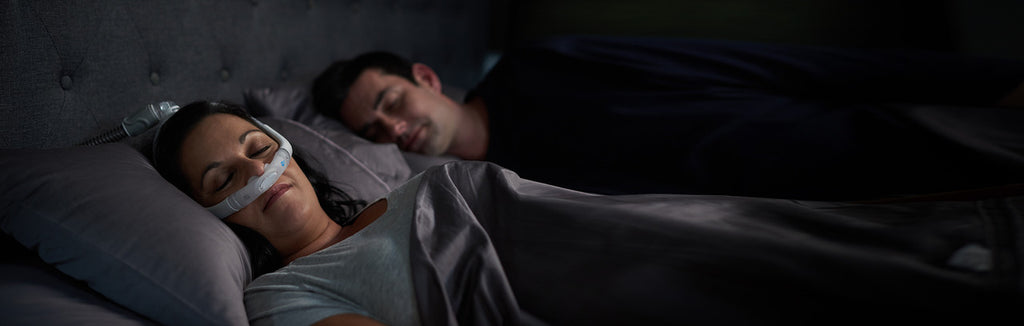 Woman Sleeping With the ResMed AirFit P30i