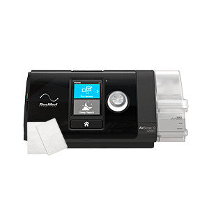A CPAP Machine with a digital display and a two rectangular CPAP filters in front.