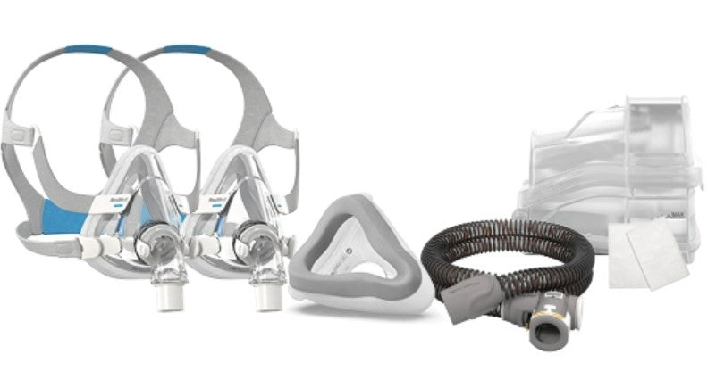 A set of two AirTouch masks with a CPAP cushion and accessories on the side