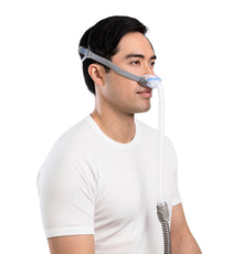 man wearing ResMed AirFit N30 Nasal Cradle Mask